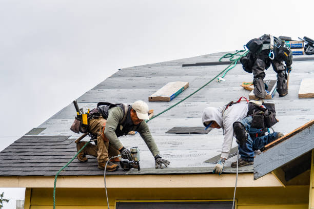 Professional Gutter Installation technician working in Mikkalo, OR